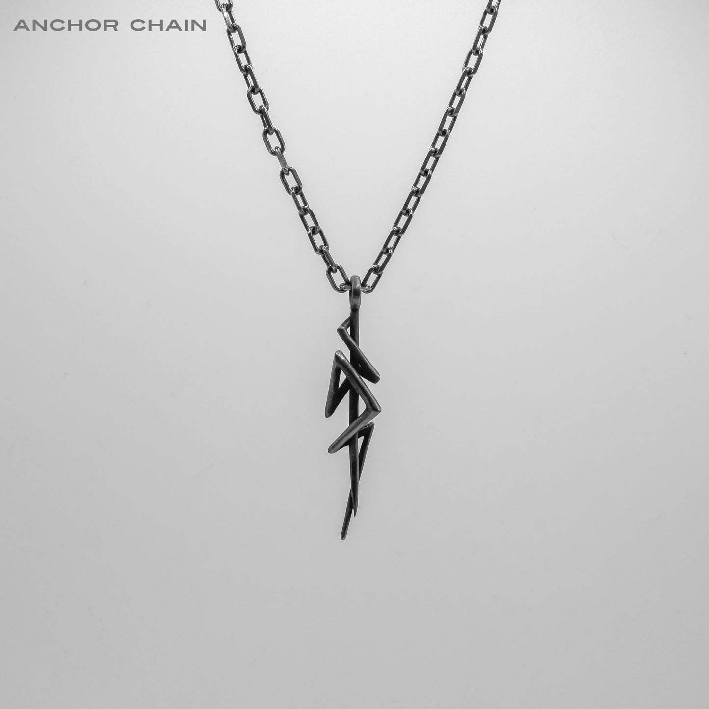 BLACKENED SURGE PENDANT