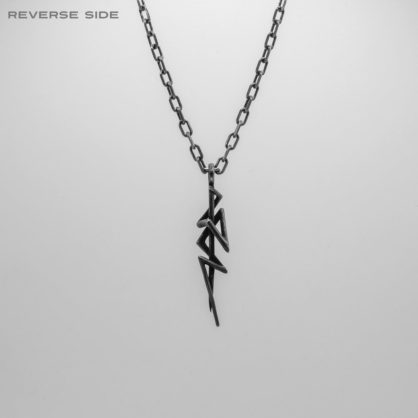 BLACKENED SURGE PENDANT