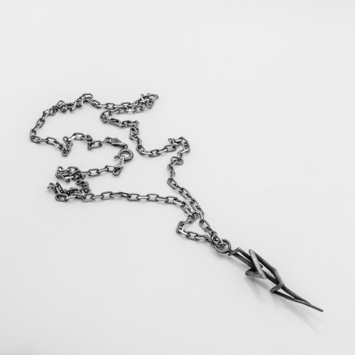 BLACKENED SURGE PENDANT