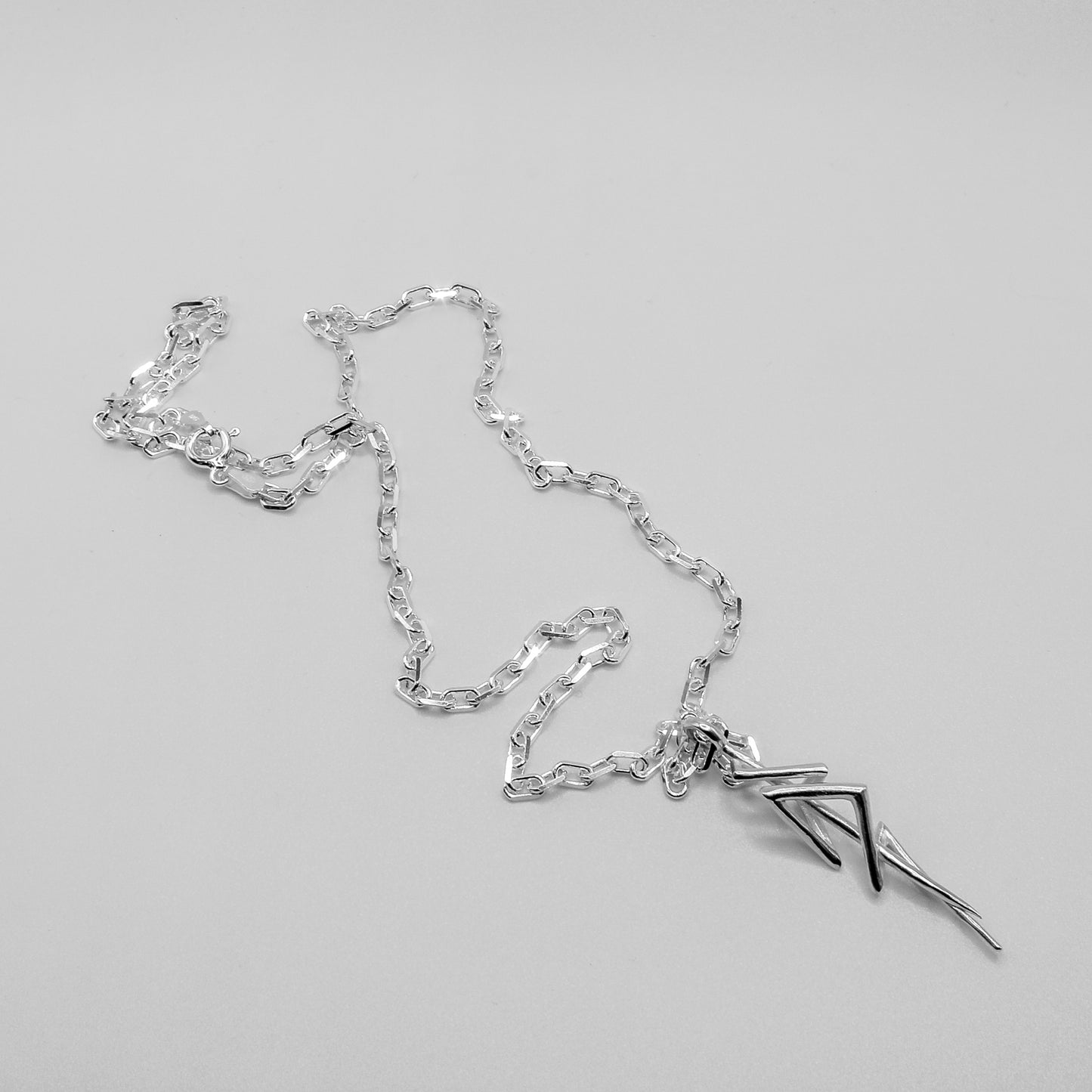 POLISHED SURGE PENDANT